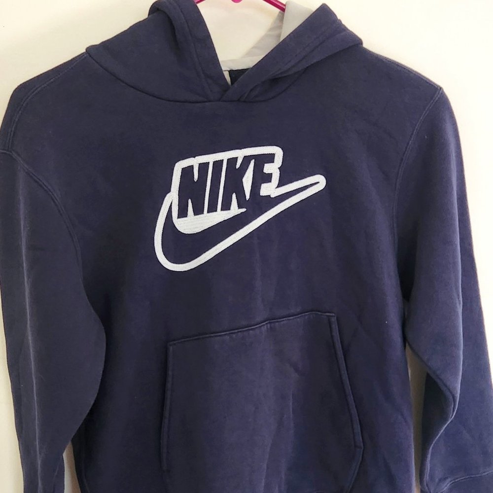 Nike pull over hoodies Kid's size 8/S  - navy blue